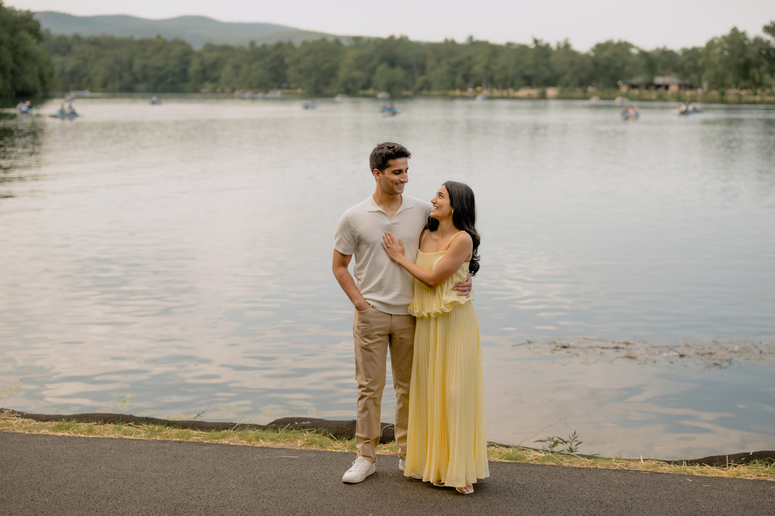 Couple by the lake during their Romantic Bear Mountain Engagement Session