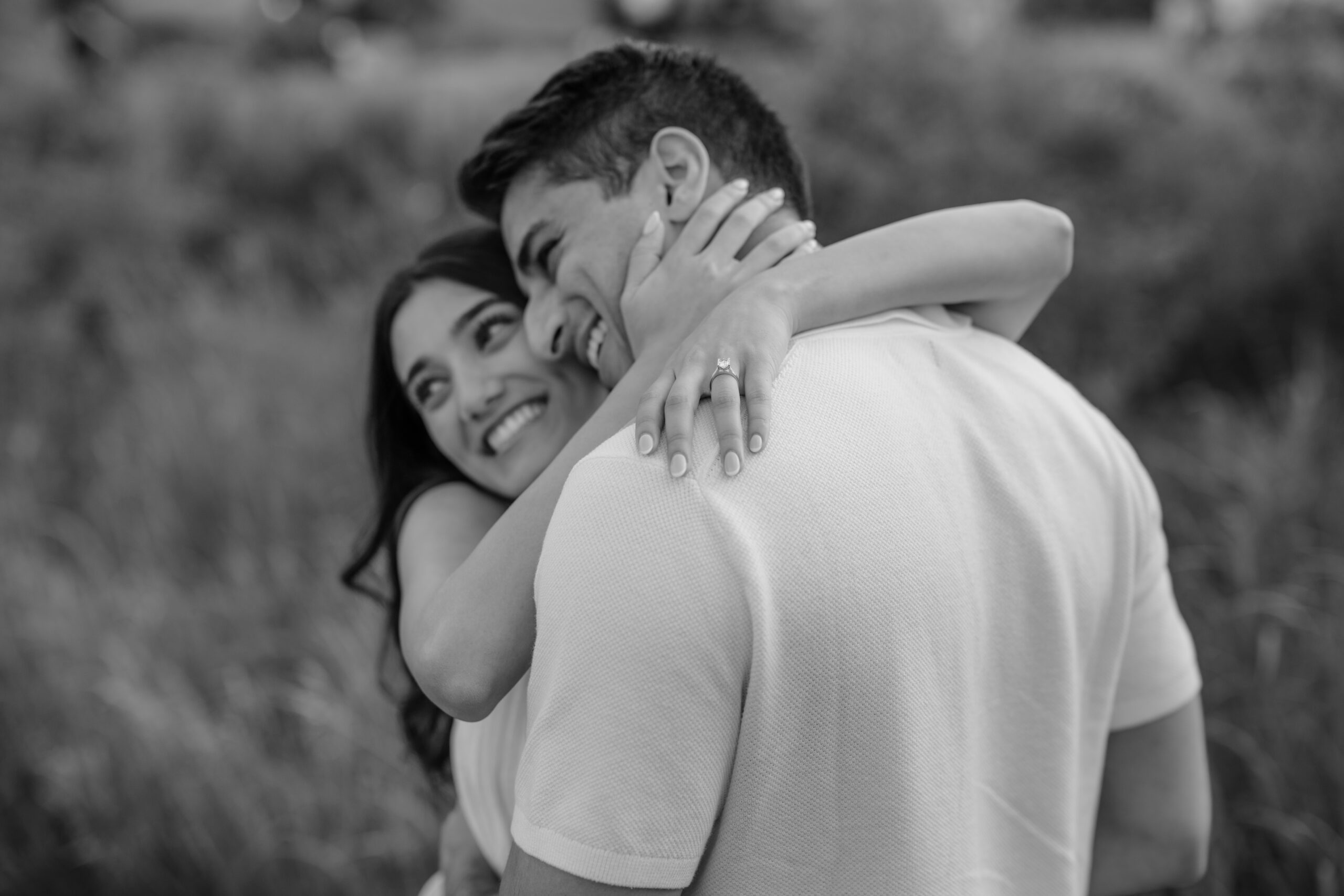 Couple hugging during their Romantic Bear Mountain Engagement Session