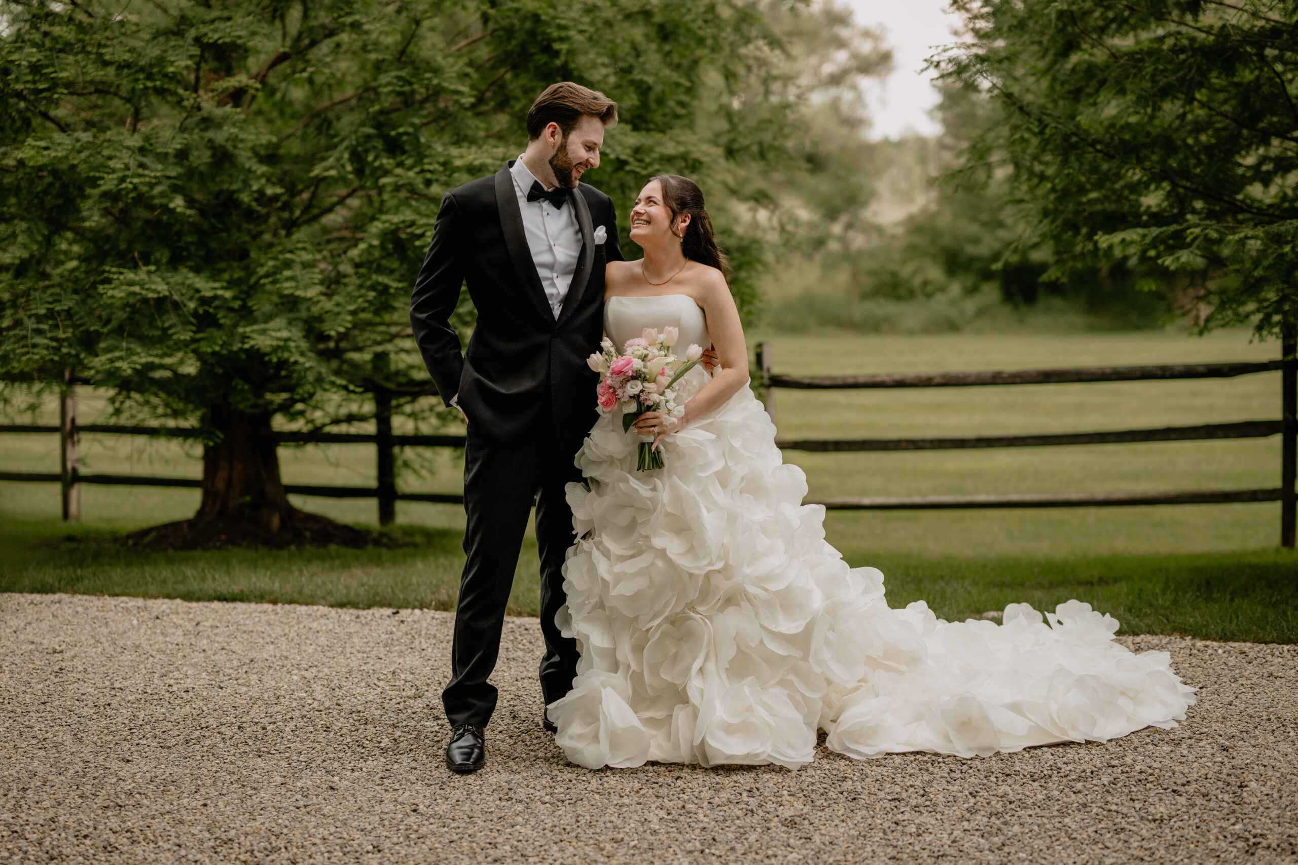 Couple smiling at each other before their Beautiful Wedding at Crossed Keys Estate.