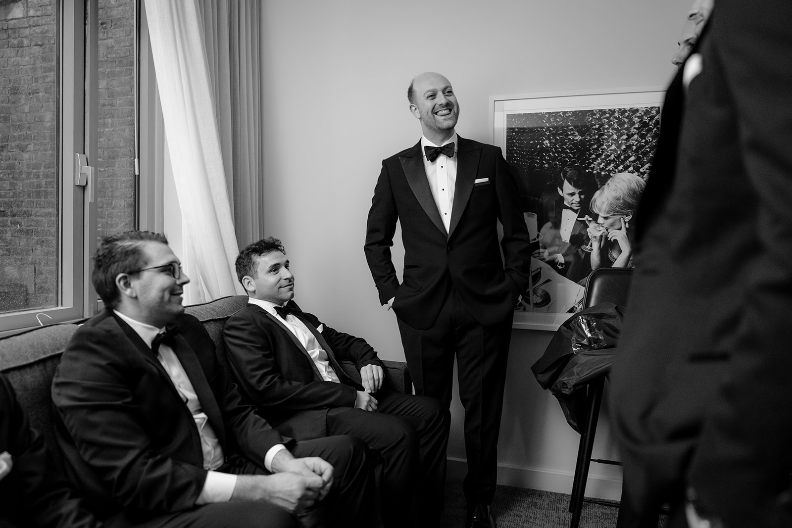 Groom with his groomsmen before their intimate wedding at Tribeca Rooftop