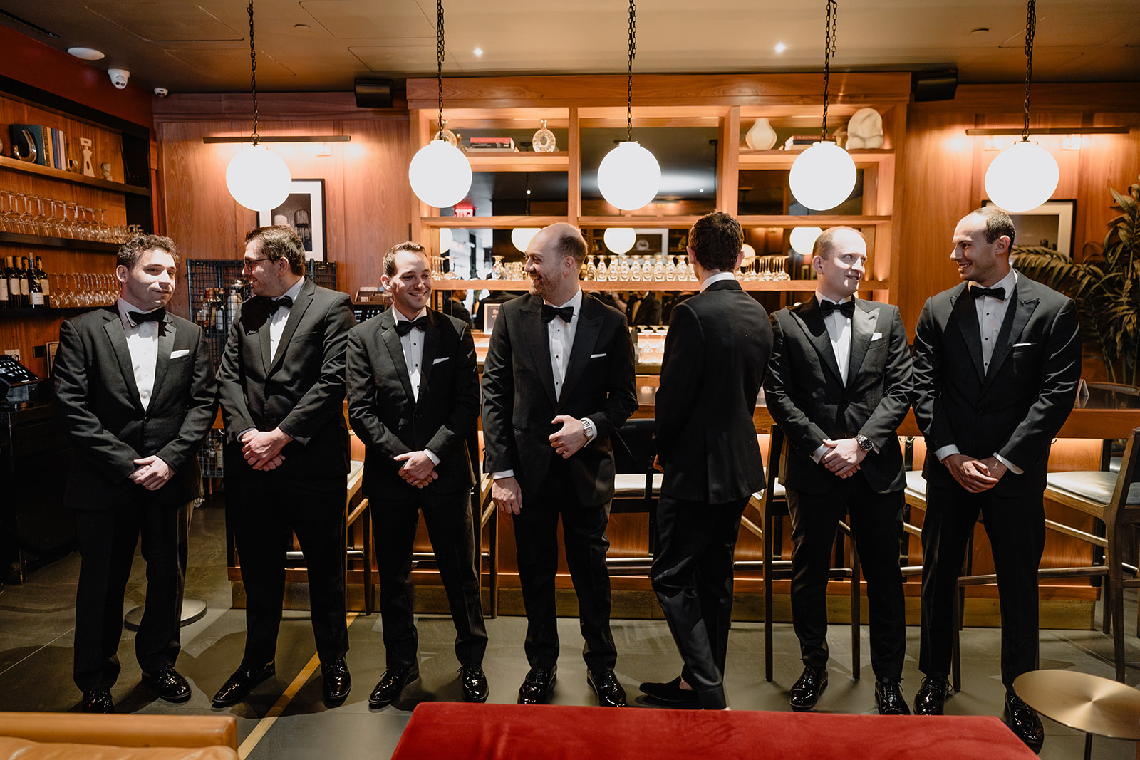 Groom with his groomsmen before their intimate wedding at Tribeca Rooftop