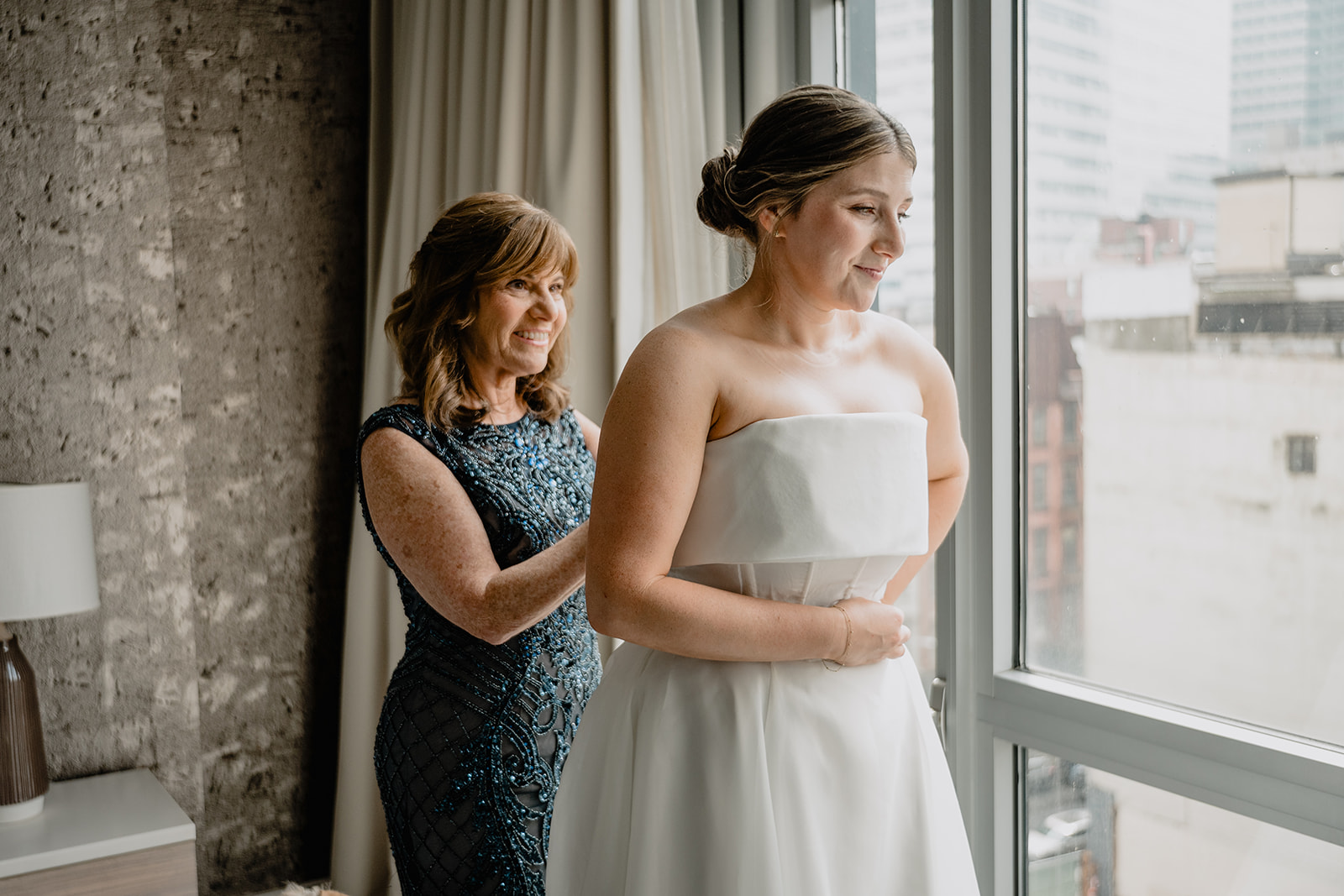 Bride getting ready before their intimate wedding at Tribeca Rooftop