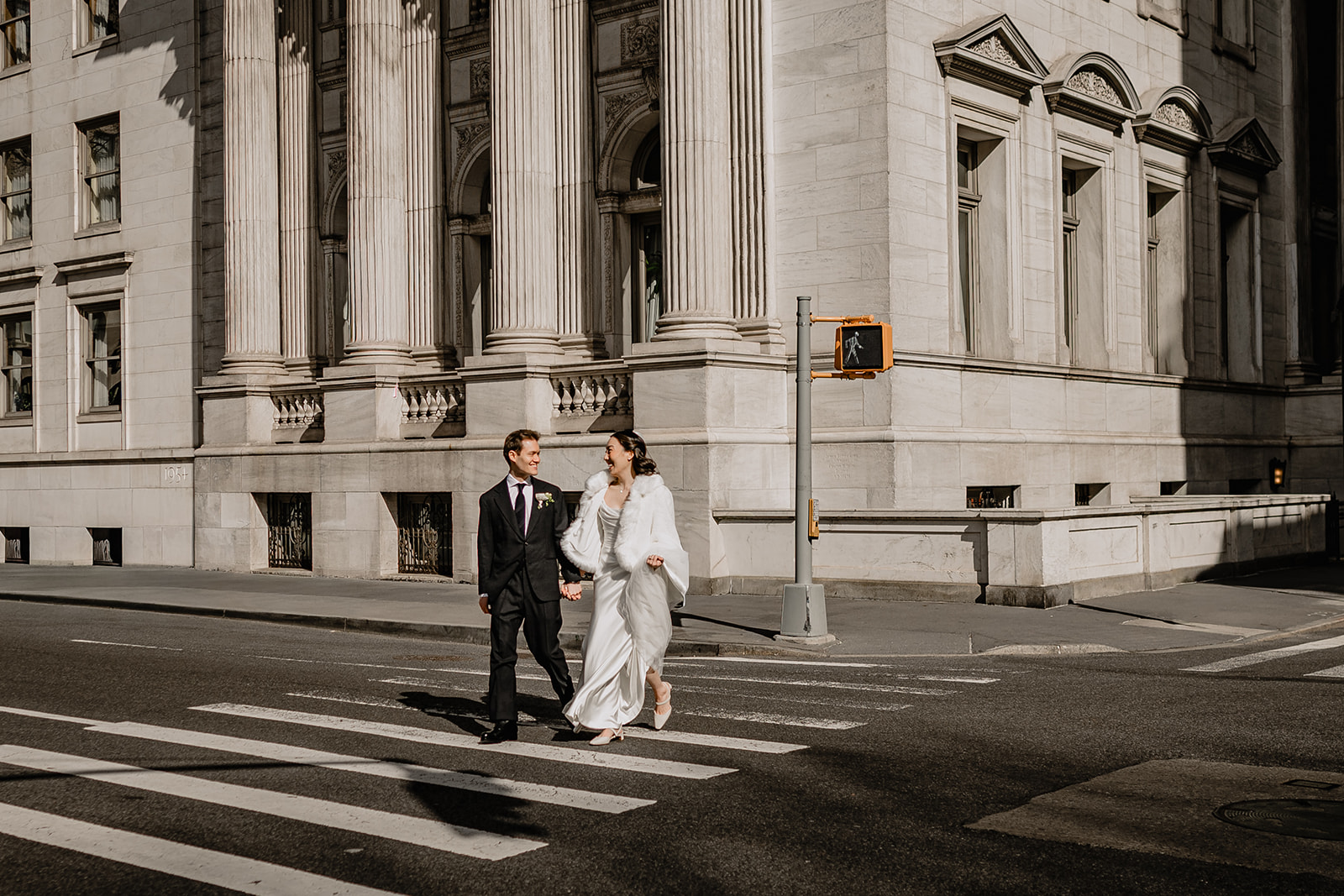 Couple crossing the road before their Wedding at Blackbarn.