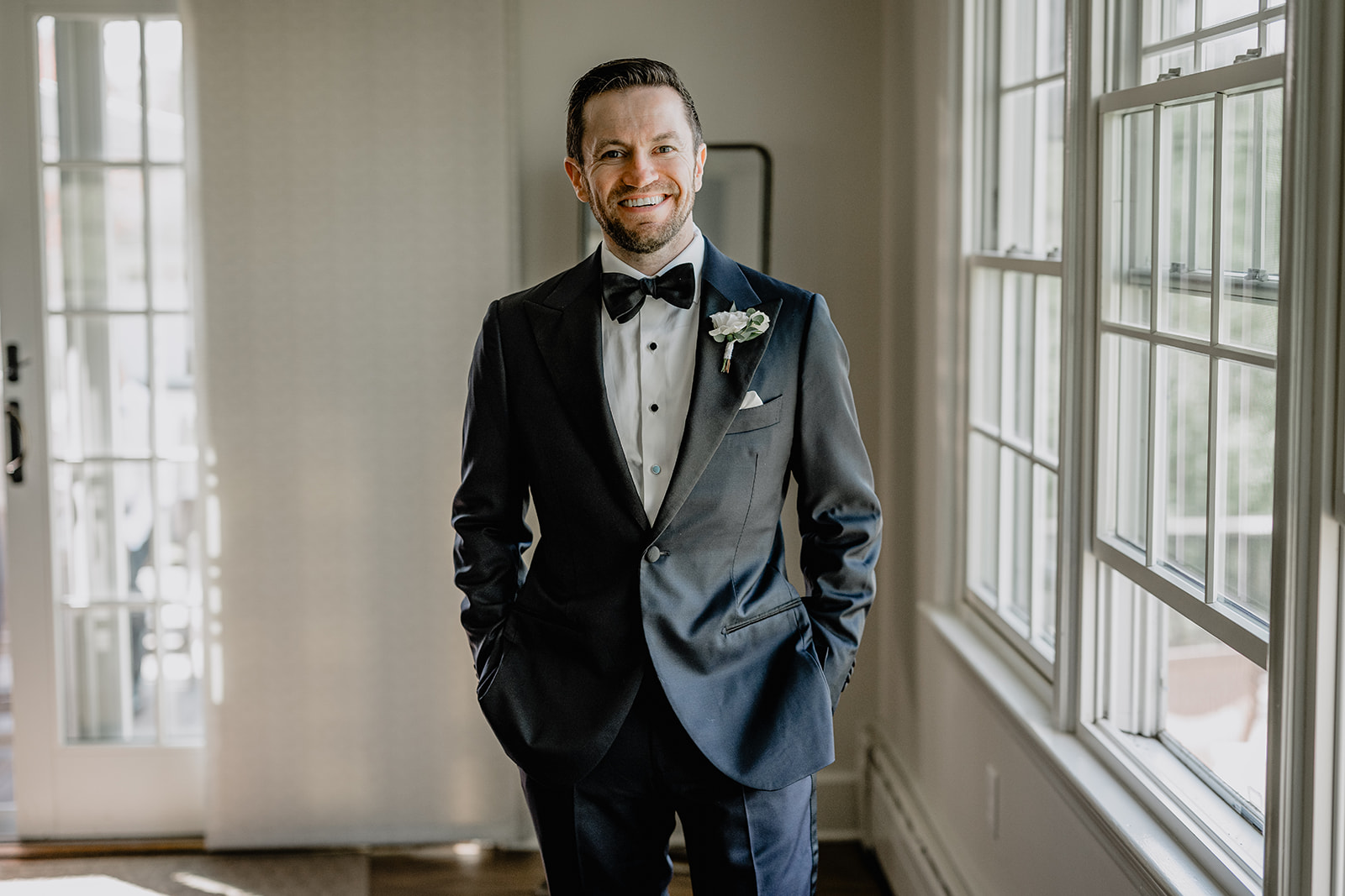 Groom's portrait before their beautiful wedding at Crossed Keys Estate.