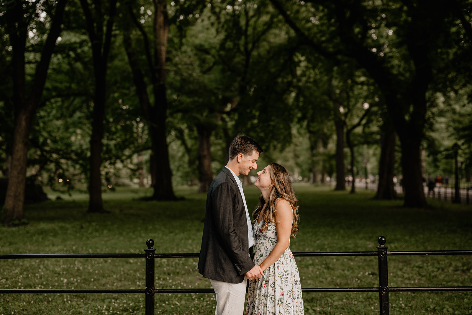 Couple with a beautiful greenery during Engagement Session in Central Park.