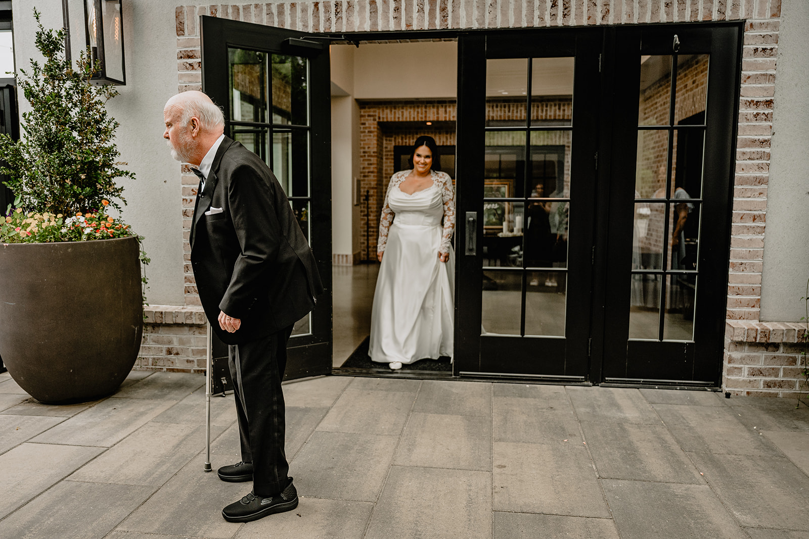 Bride's first look with her parent before their Beautiful Wedding at Perona Farms Refinery